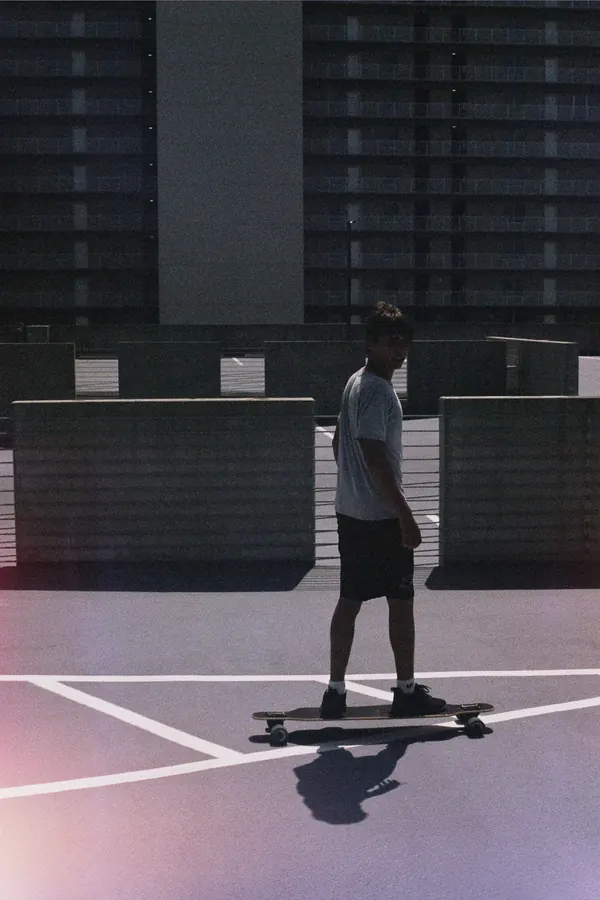 Boy longboarding