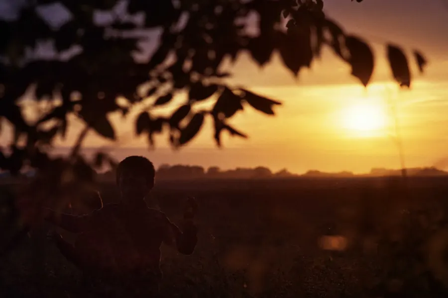 Kids playing in field